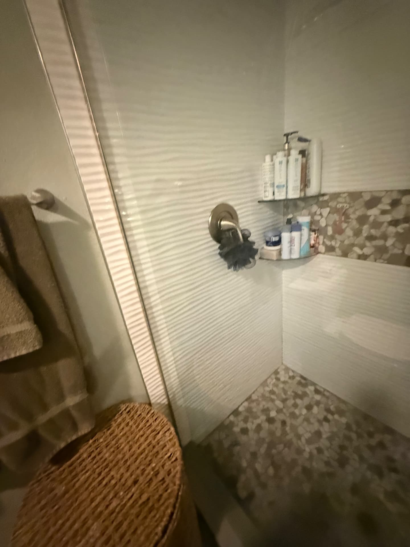 Scrubbed tile shower with pebble floor after a Lustre Haus deep clean in Mesa