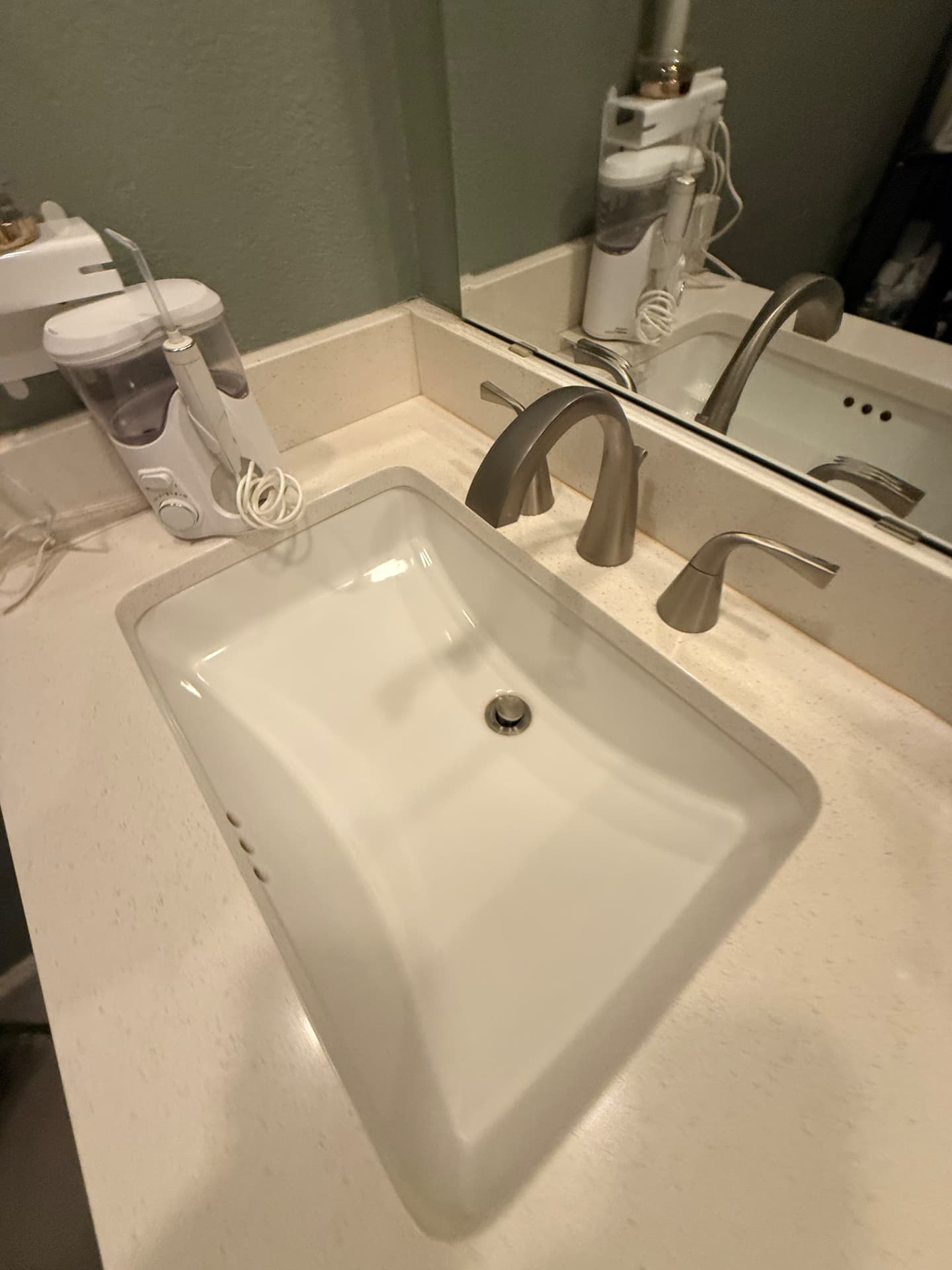 Sanitized bathroom vanity and polished fixtures after a Lustre Haus deep clean in Chandler
