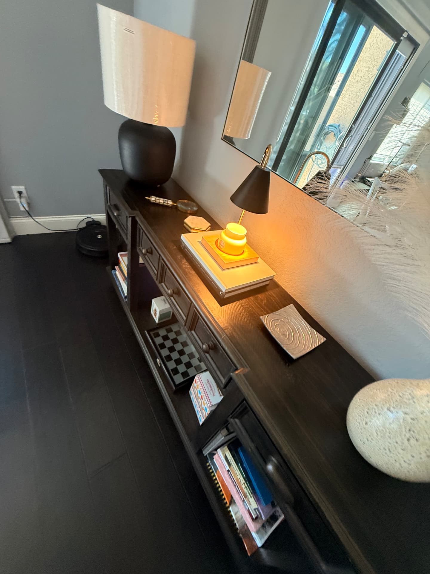 Dusted entry console, lamps and mirror after a Lustre Haus clean in Paradise Valley
